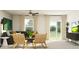 Comfortable living room featuring modern seating, and a large window letting in plenty of natural light at 6394 Journey Way, New Port Richey, FL 34655