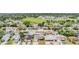 Aerial view of a neighborhood featuring single-Gathering homes and mature trees at 6908 Mesa Verde St, Port Richey, FL 34668