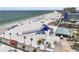 Aerial view of beach with water slide and recreational activities near hotels and clear water at 701 S Madison Ave # 505, Clearwater, FL 33756