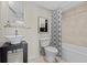 Bathroom with sleek vessel sink, modern tile and shower and tub combination at 701 S Madison Ave # 505, Clearwater, FL 33756