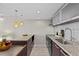 Contemporary kitchen showcasing granite countertops and stainless steel sink at 701 S Madison Ave # 505, Clearwater, FL 33756