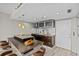 Modern kitchen features a breakfast bar with granite countertops at 701 S Madison Ave # 505, Clearwater, FL 33756