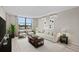 Comfortable living room with modern furnishings and bright natural lighting at 701 S Madison Ave # 505, Clearwater, FL 33756