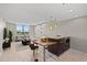 Bright and open living room features a breakfast bar and ample natural light at 701 S Madison Ave # 505, Clearwater, FL 33756