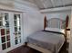 Comfortable bedroom with natural light and hardwood floors at 703/709 Patterson St, Clearwater, FL 33756