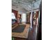 Elegant bedroom featuring a four-poster bed and hardwood floors at 703/709 Patterson St, Clearwater, FL 33756