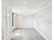 A bright bedroom with wood floors, a ceiling fan, and lots of natural light at 705 3Rd Ne Ave, Largo, FL 33770