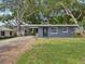 Charming single-story home with a well-maintained lawn and inviting curb appeal at 705 3Rd Ne Ave, Largo, FL 33770