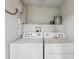 Functional laundry area with a side by side washer and dryer at 705 3Rd Ne Ave, Largo, FL 33770