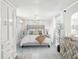 Relaxing main bedroom with stylish furniture and decor at 705 3Rd Ne Ave, Largo, FL 33770
