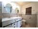 Stylish bathroom featuring double sinks, modern vanity, and updated fixtures for a spa-like experience at 807 E Chapman Rd, Lutz, FL 33549