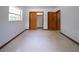 Bright bedroom with white walls, closet, and large window that offers ample natural light at 807 E Chapman Rd, Lutz, FL 33549