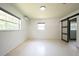 Bright bedroom with plenty of light with updated lighting, paint and floors at 807 E Chapman Rd, Lutz, FL 33549