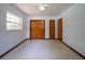 This bedroom has a ceiling fan, window for natural light, and a closet for storage solutions at 807 E Chapman Rd, Lutz, FL 33549