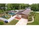 Charming single-Gathering home with a pool, playground, solar panels, and a well-maintained yard at 807 E Chapman Rd, Lutz, FL 33549