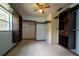 Spacious walk-in closet with custom shelving and rod system for optimal organization and storage at 807 E Chapman Rd, Lutz, FL 33549