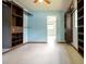 Large walk-in closet featuring custom organizers, shelving and plenty of space for all your clothing at 807 E Chapman Rd, Lutz, FL 33549