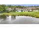 Charming home overlooking picturesque pond with lush landscaping and scenic community at 8375 Burgundy N Dr, Pinellas Park, FL 33781