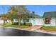 Charming single-story home with a well-manicured lawn and attached garage, perfect for low-maintenance living at 8375 Burgundy N Dr, Pinellas Park, FL 33781
