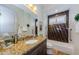 Bathroom featuring granite vanity and tiled shower at 1012 Tuscany Dr, Trinity, FL 34655