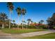 Lush landscaping complements this community property and driveway leading up to the homes at 1012 Tuscany Dr, Trinity, FL 34655