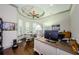 Comfortable home office featuring hardwood floors, bay window, and desk with monitor at 1012 Tuscany Dr, Trinity, FL 34655