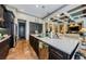 Spacious kitchen island with quartz countertop and stainless steel dishwasher at 1012 Tuscany Dr, Trinity, FL 34655