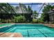 A sparkling pool with a screened enclosure creates a relaxing and private outdoor oasis at 1012 Tuscany Dr, Trinity, FL 34655