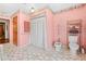 Unique bathroom showcasing a bidet, toilet, shower with floral curtain, and built-in shelving at 10193 Wallien Dr, Brooksville, FL 34601