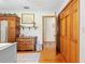 Charming bedroom featuring hardwood floors, rustic wood furniture, and a cozy, inviting atmosphere at 10193 Wallien Dr, Brooksville, FL 34601