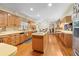 Large kitchen featuring wooden cabinets, an island, and abundant countertop space for cooking at 10193 Wallien Dr, Brooksville, FL 34601