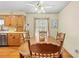 Charming kitchen area showcasing traditional cabinets, ample counter space, and warm natural light at 10193 Wallien Dr, Brooksville, FL 34601