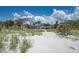 Beautiful beachfront property with a grand home nestled among lush greenery, offering stunning views of the beach at 1114 Mandalay Pt, Clearwater Beach, FL 33767
