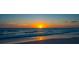 Ocean sunset with golden sun and ocean waves at 1114 Mandalay Pt, Clearwater Beach, FL 33767