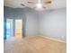 Bedroom with carpet and an open bathroom doorway at 12464 Berkeley Square Dr, Tampa, FL 33626