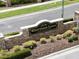 Westwood Lakes community sign with stone accents and landscaping, showcasing the neighborhood's welcoming entrance at 12918 Tar Flower Dr., Tampa, FL 33626
