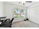 Bedroom with a ceiling fan, two windows, and a closet, providing ample natural light and space at 13235 Palmerston Rd, Riverview, FL 33579