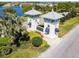 Triple Creek's charming entrance features manicured landscaping and distinct architectural towers at 13235 Palmerston Rd, Riverview, FL 33579
