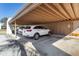 Designated covered parking spot with ample space for parking vehicles at 1371 Mission Hills Blvd, Clearwater, FL 33759