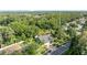 An aerial shot showing the mature trees surrounding this lovely home with manicured lawn and private yard at 15123 Bald Eagle St, Tampa, FL 33625