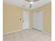 Bedroom boasts tile floors, closet space, and natural light at 15123 Bald Eagle St, Tampa, FL 33625