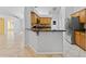 Spacious kitchen with tile floors, granite counters, stainless steel appliances, and ample cabinet space at 15123 Bald Eagle St, Tampa, FL 33625