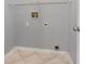Bare laundry room with tile flooring and utility connections at 15123 Bald Eagle St, Tampa, FL 33625