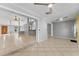 Open floor plan featuring tile floors and views of the kitchen and living room at 15123 Bald Eagle St, Tampa, FL 33625