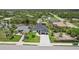 A beautiful aerial view of the property and its landscaping, including a canal at 15218 Appleton Blvd, Port Charlotte, FL 33981