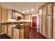 Modern kitchen featuring stainless steel appliances and custom wood cabinetry at 17824 Morninghigh Dr, Lutz, FL 33549
