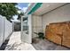 A side room with shelving and concrete flooring at 17824 Morninghigh Dr, Lutz, FL 33549