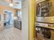 Laundry area located off of kitchen, featuring a washer and dryer at 200 Country Club Dr # 202, Largo, FL 33771