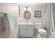 Clean bathroom featuring a sink, toilet, shower with neutral colors at 214 Caryl Way, Oldsmar, FL 34677