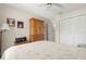 Bedroom featuring a ceiling fan, closet, and natural lighting at 214 Caryl Way, Oldsmar, FL 34677